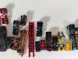 many different types of toy trains on a white surface