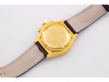 an image of a close up of a wrist watch on a white surface