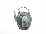 a tea pot with a handle on a white background