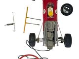 a toy race car with a steering and a steering wheel