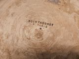 a close up of a vase with a label on it