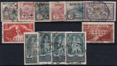 several different types of stamps are displayed on a black surface
