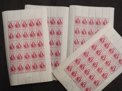 three red and white stamps with a picture of a woman on them