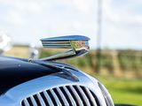 a close up of a car ' s hood ornament
