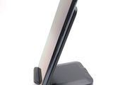 a cell phone that is sitting on top of a stand