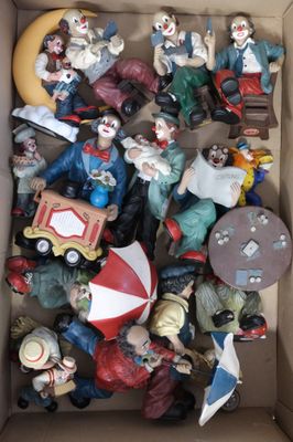 a box full of clown figurines that are in it