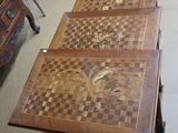 a table that has a chess board on top of it
