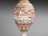 an image of a vase with a lid sitting on a table