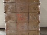a large stack of boxes sitting on top of a pallet