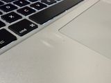 a close up of a laptop keyboard on a table
