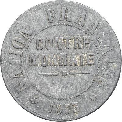 une vieille pièce de monnaie sur laquelle sont inscrits les mots " don't be a man alive " (ne soyez pas un homme vivant)