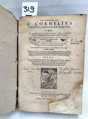 an open book with a picture of a man on it