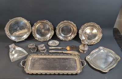 a lot of silver items that are on a table