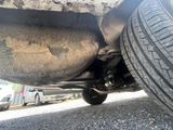 a close up of a car ' s exhaust pipe and exhaust pipe