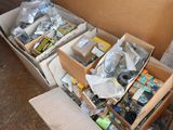 two boxes of assorted items sitting on the floor