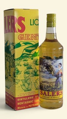 a bottle of liquor sitting next to a box of liquor