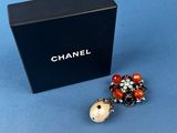 a close up of a box with some beads on it
