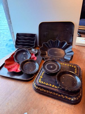 a table with a variety of dishes and pans on it