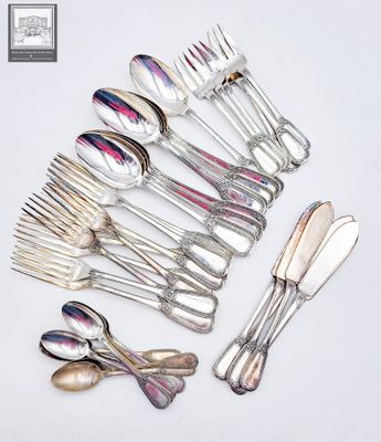 a lot of silver spoons and forks on the table