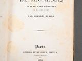 an open book with a black and white title on it