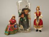 three figurines that are sitting next to each other