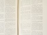 an open book that is sitting on a table