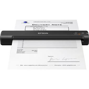 un scanner noir posé sur une feuille de papier