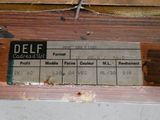 a close up of a piece of wood with a label on it