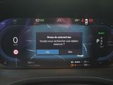 the dashboard of a car with a digital display on it