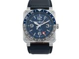 une photo d'une montre avec un cadran bleu et un bracelet en cuir noir