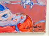 a painting of a football helmet and a helmet on a table