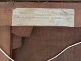 a piece of paper on a piece of wood that has a piece of paper attached to it