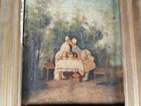 a picture of a painting of a family sitting at a table
