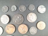 a lot of coins that are on the table