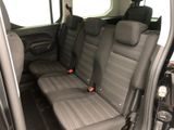 two seats in the back of a van that are empty