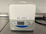 an image of a counter top with a digital clock on it