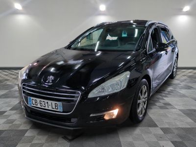 a picture of a black car parked in a garage