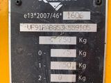 a close up of a sign on the side of a tractor