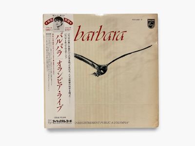 the cover of a book with an image of a bird flying over it