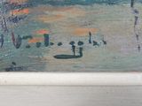 a painting on the wall of a room with a cat laying on the floor