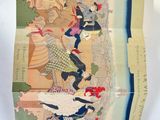 an open book with a picture of people walking on a beach