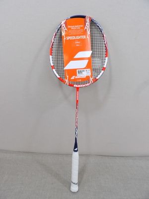 a tennis racket with a package on it