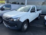 a picture of a white pick up truck parked in a parking lot