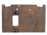 an old rusted metal switch plate on a white background