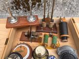 a wooden box filled with different types of items
