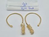 two pairs of gold plated earrings with glass beads on them