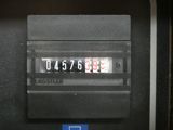 a close up of a clock on the side of a train