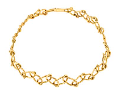 un bracelet en chaîne d'or à maillons avec un fermoir