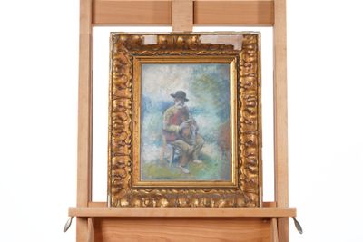 a painting of a man riding a horse on a easel