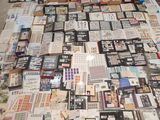 a lot of pictures on the floor of this room